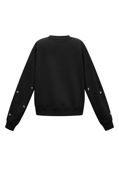 Sweater with studs