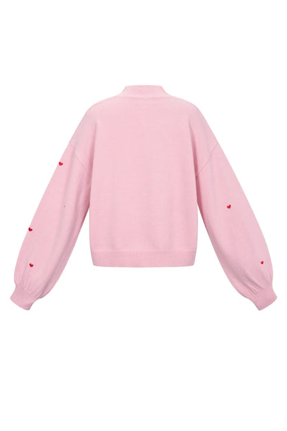 Knitted sweater with hearts