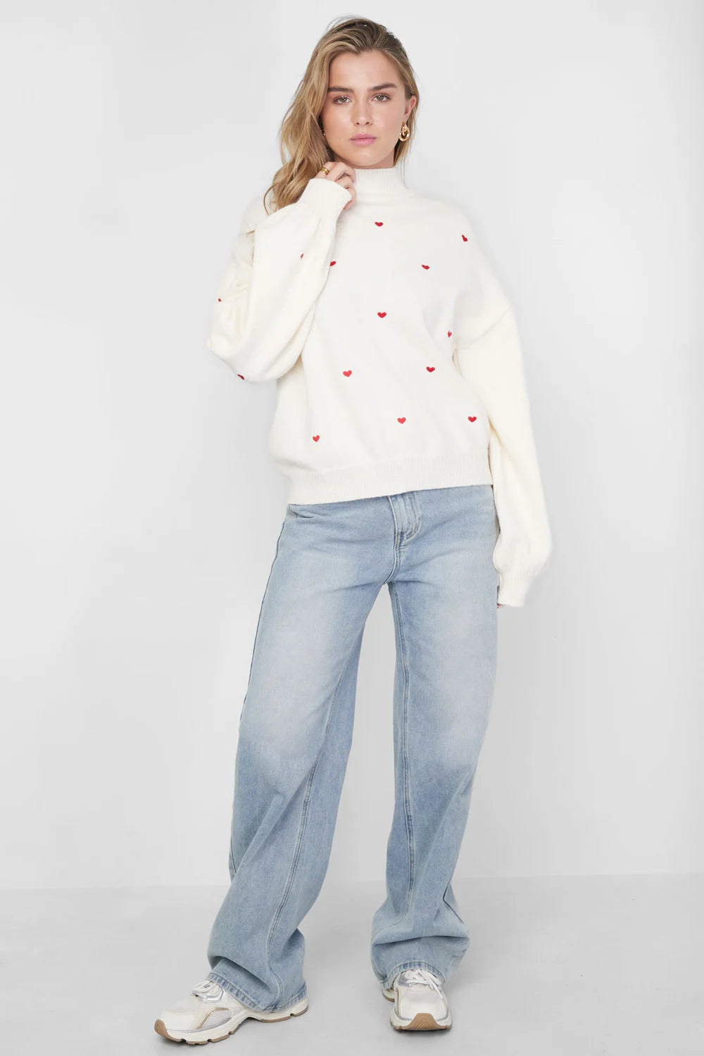 Knitted sweater with hearts