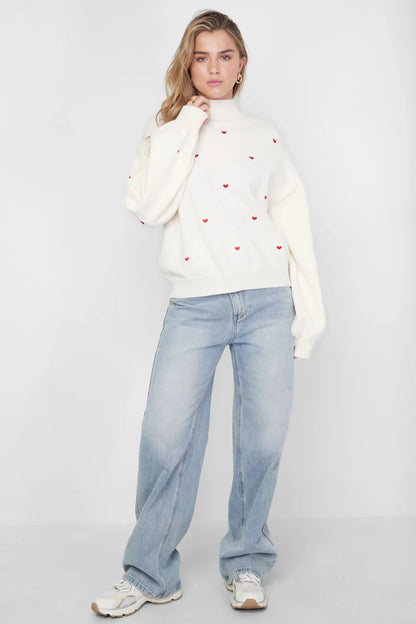 Knitted sweater with hearts