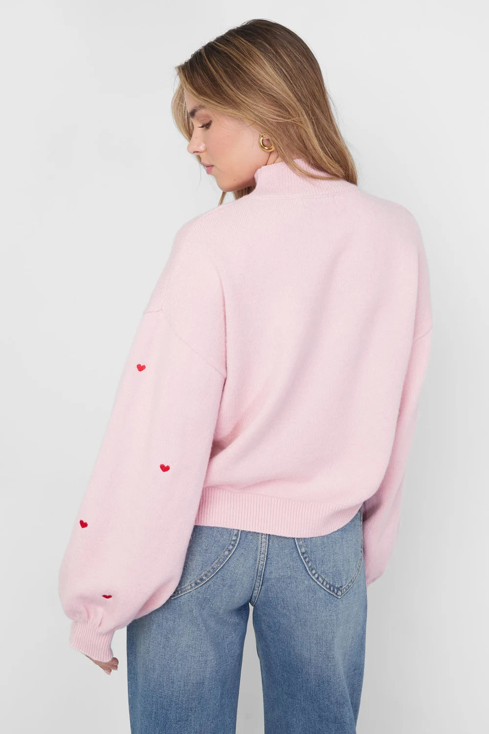 Knitted sweater with hearts